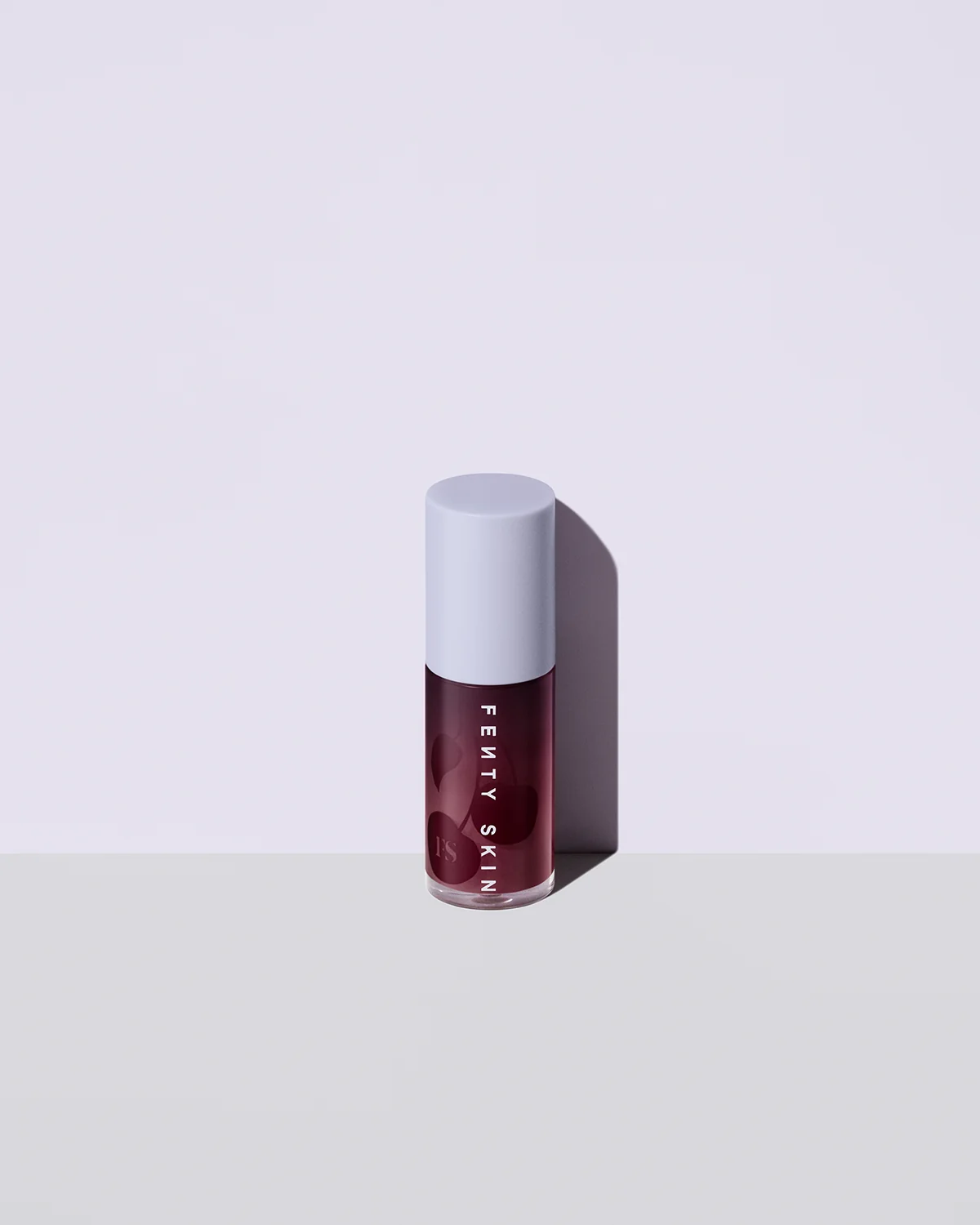 Fenty Treatz Hydrating + Strengthening Lip Oil — Black Cherry